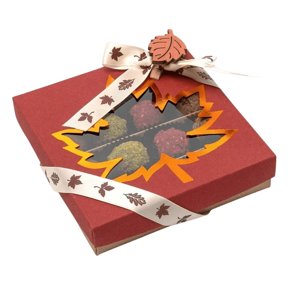 Mix di tartufi belgi autunnali in una confezione regalo rossa